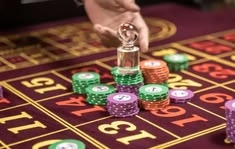 ZeusWin casino presented on mobile device in Pakistan with slots and live games